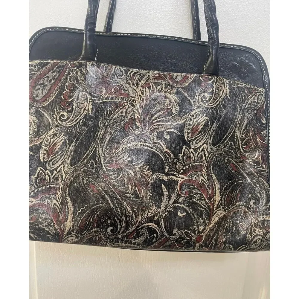 Patricia Nash Paris black shoulder bag w/ paisley design